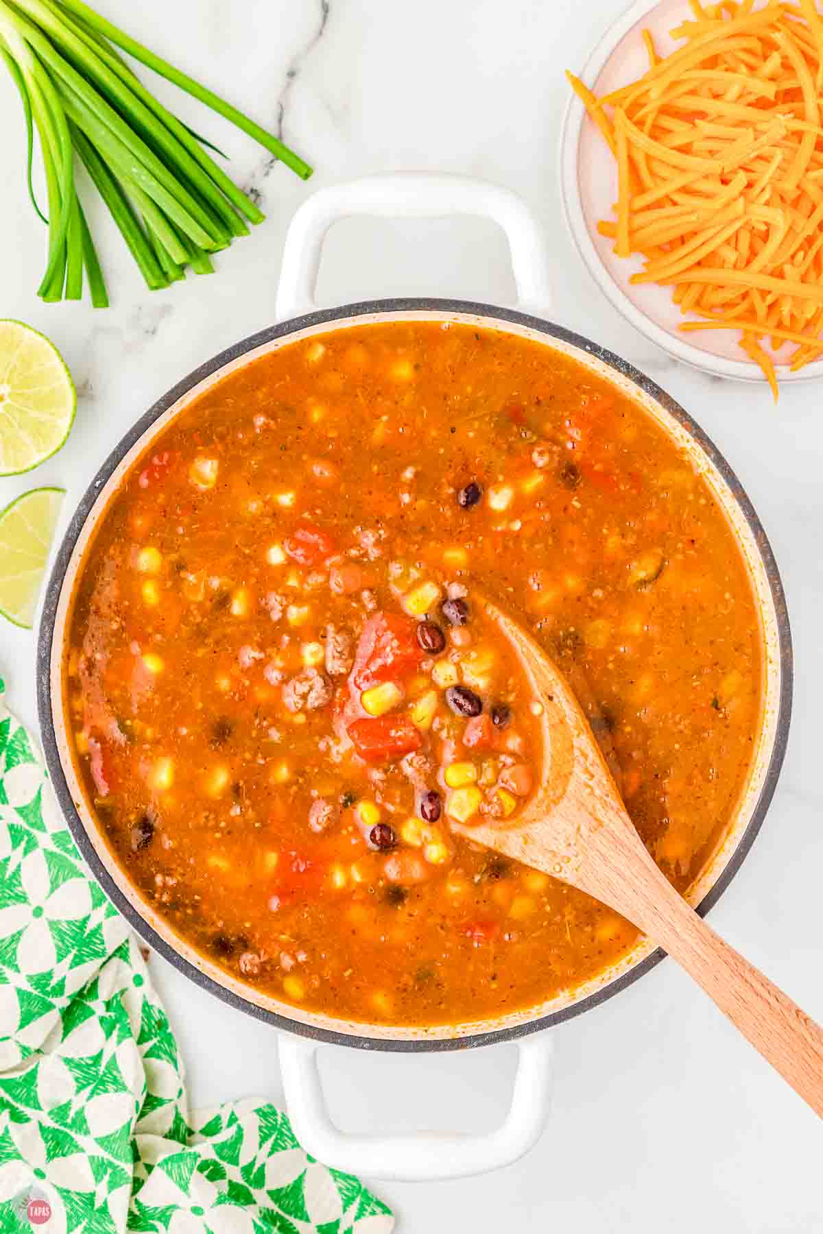 large pot of taco soup with a wood spoon