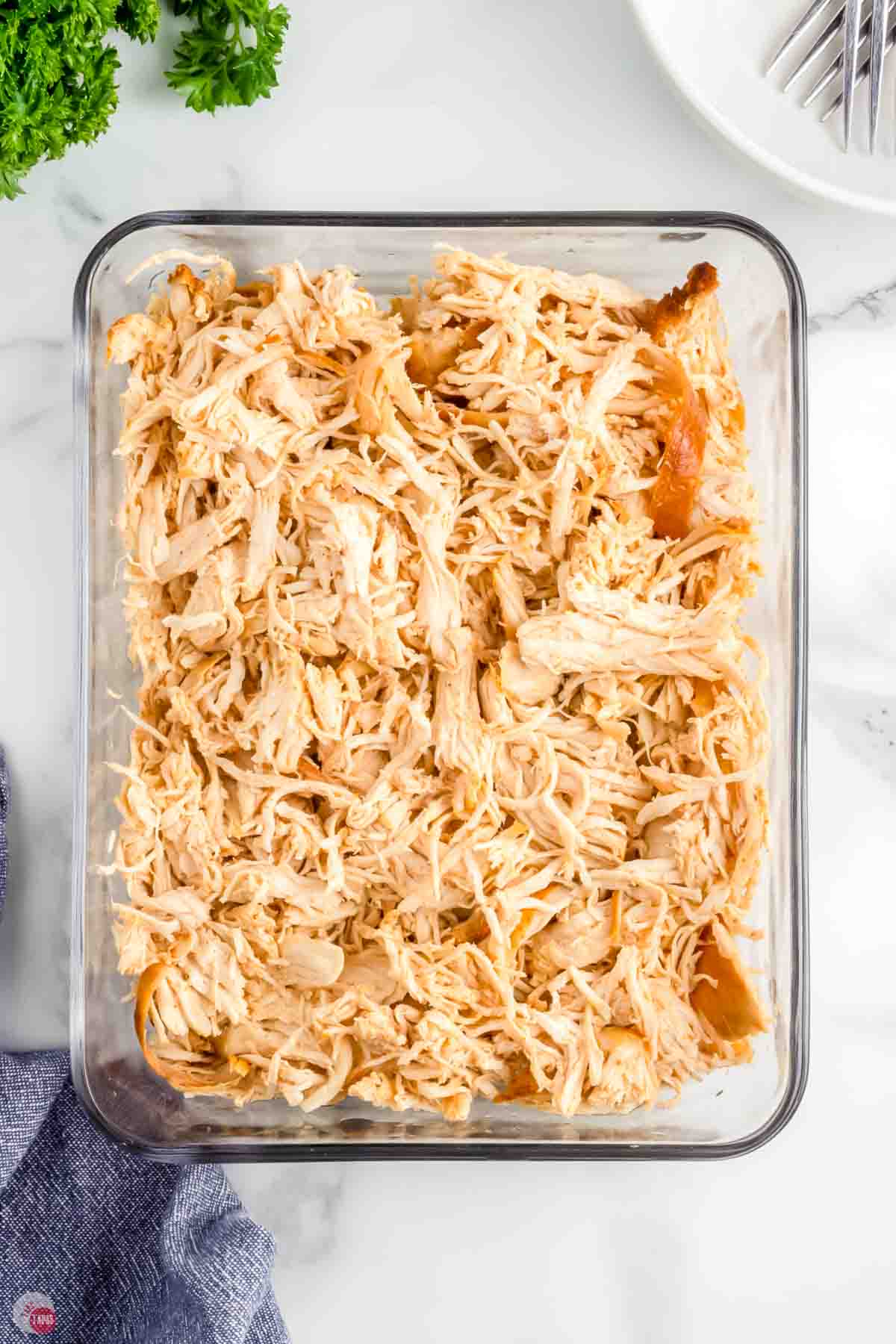 glass pan filled with chicken meat