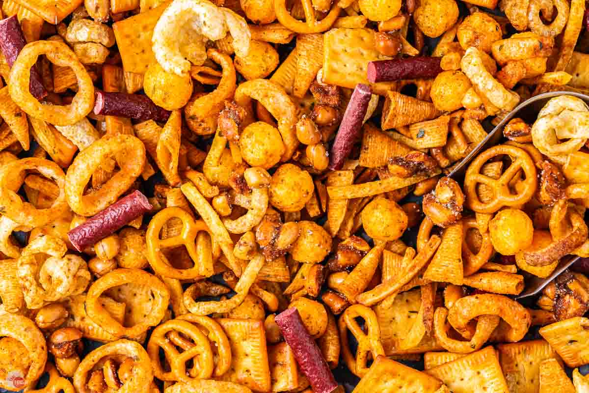 close up of snack mix on a sheet pan