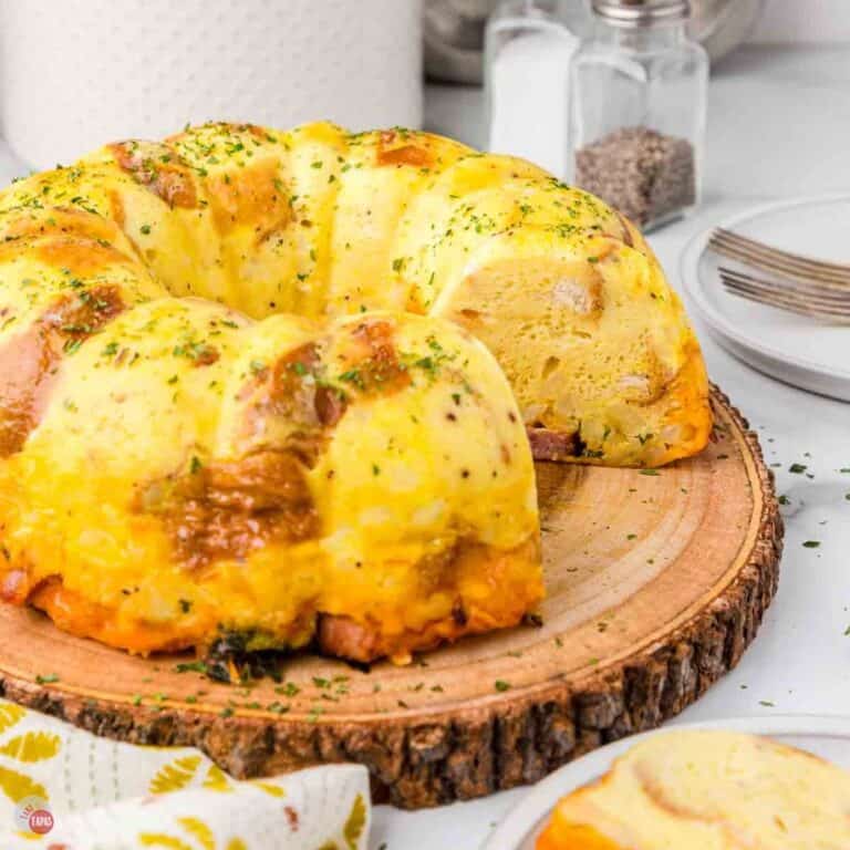 egg and ham bundt cake for breakfast on a wood board