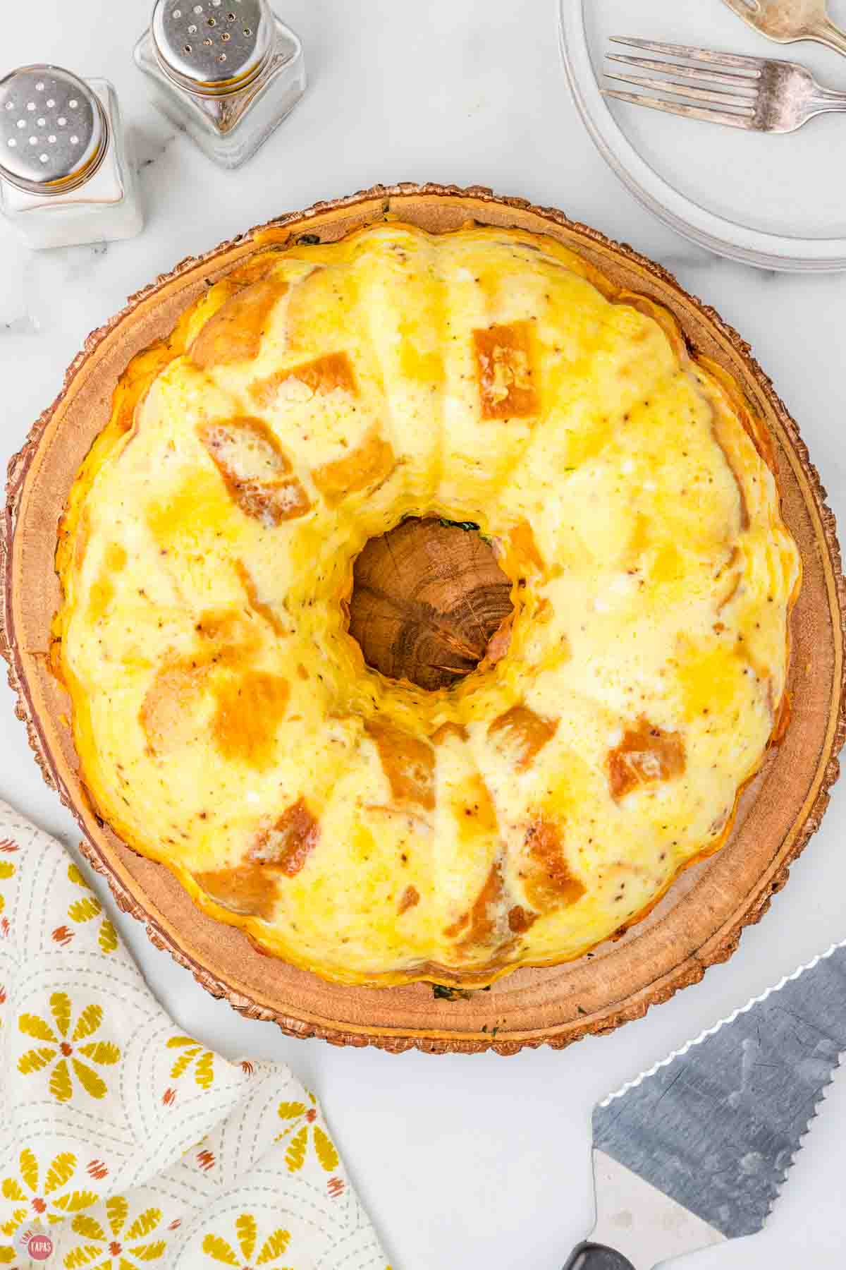 breakfast bundt cake on a circular wood board