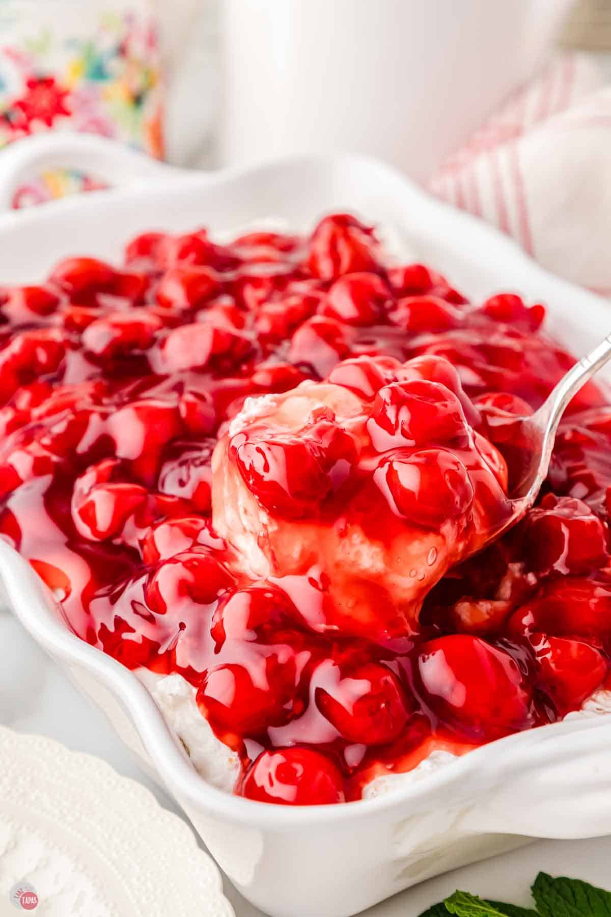 cherry dessert with a spoon scooping some out