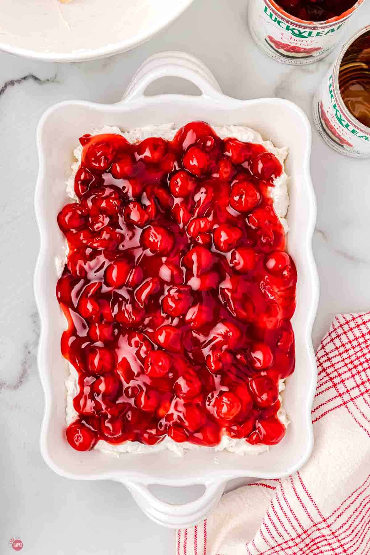 rectangle white dish with cherry dessert in it