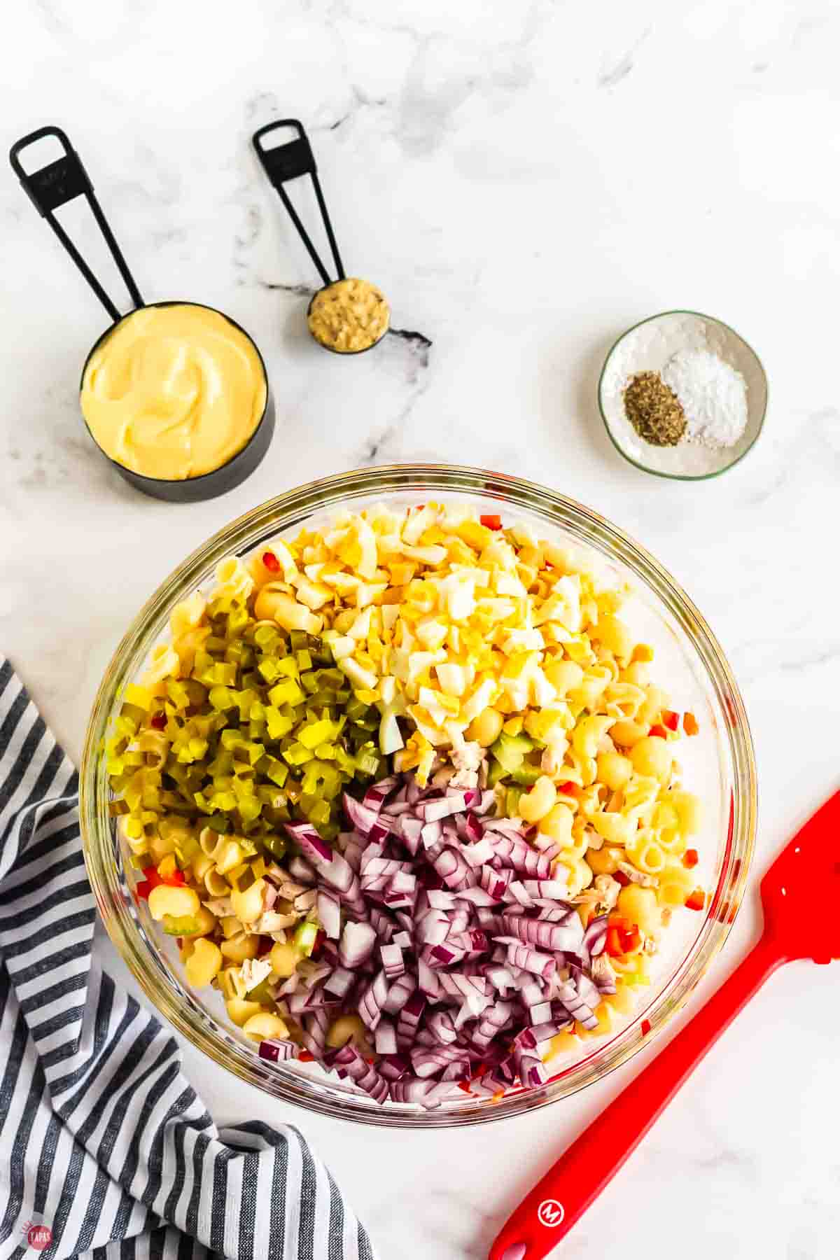 salad with diced red onion, eggs, and pickle relish