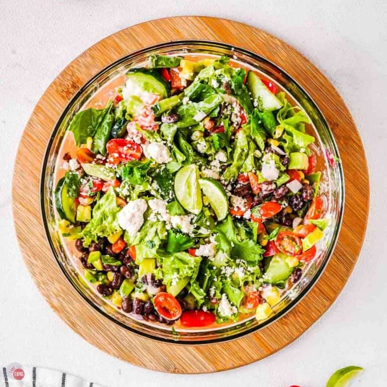 bowl of fiesta salad on a wood circle