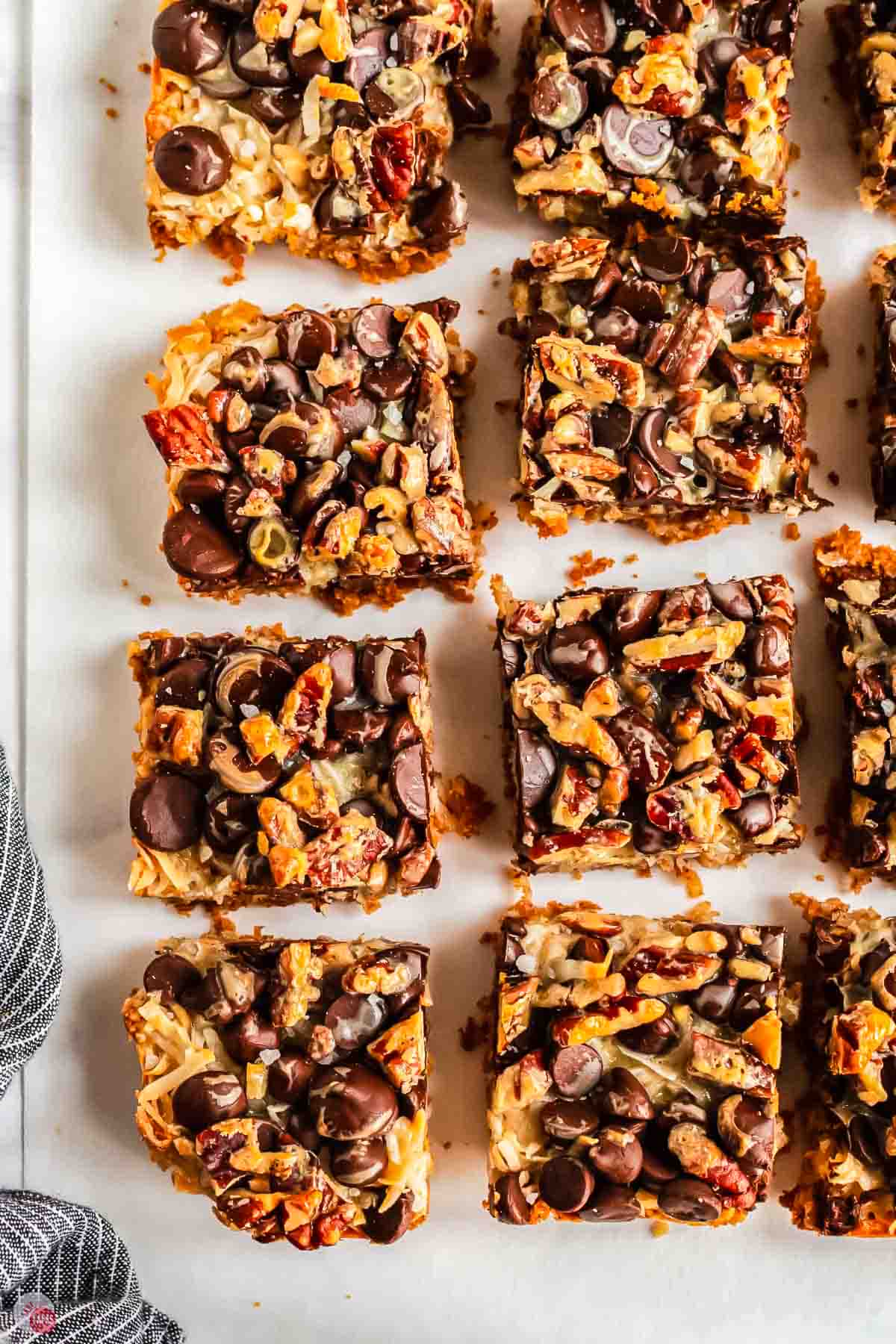 close up of cut cookie bars on parchment paper