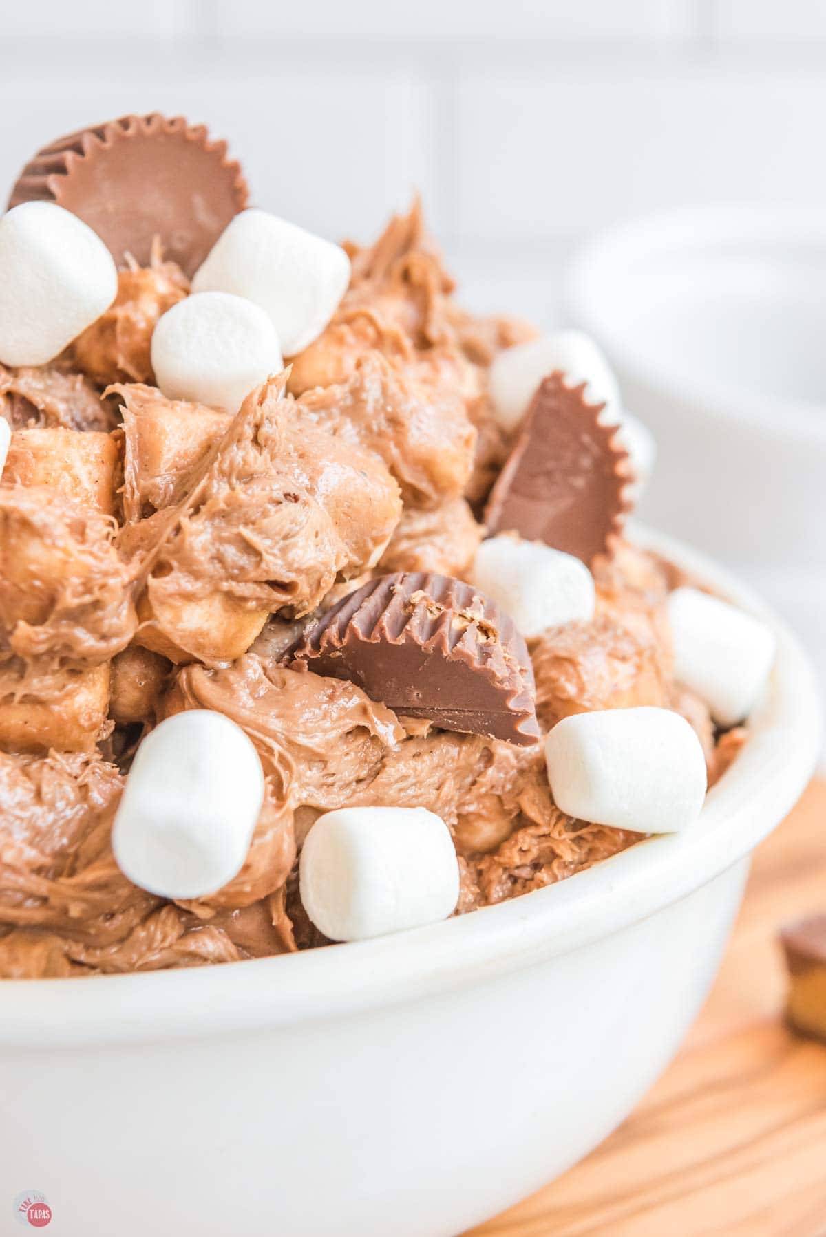close up of peanut butter dessert in a large white serving bowl