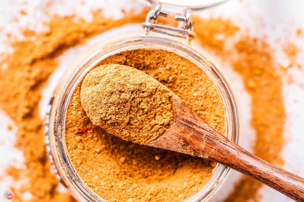 jar of spices with a small spoon