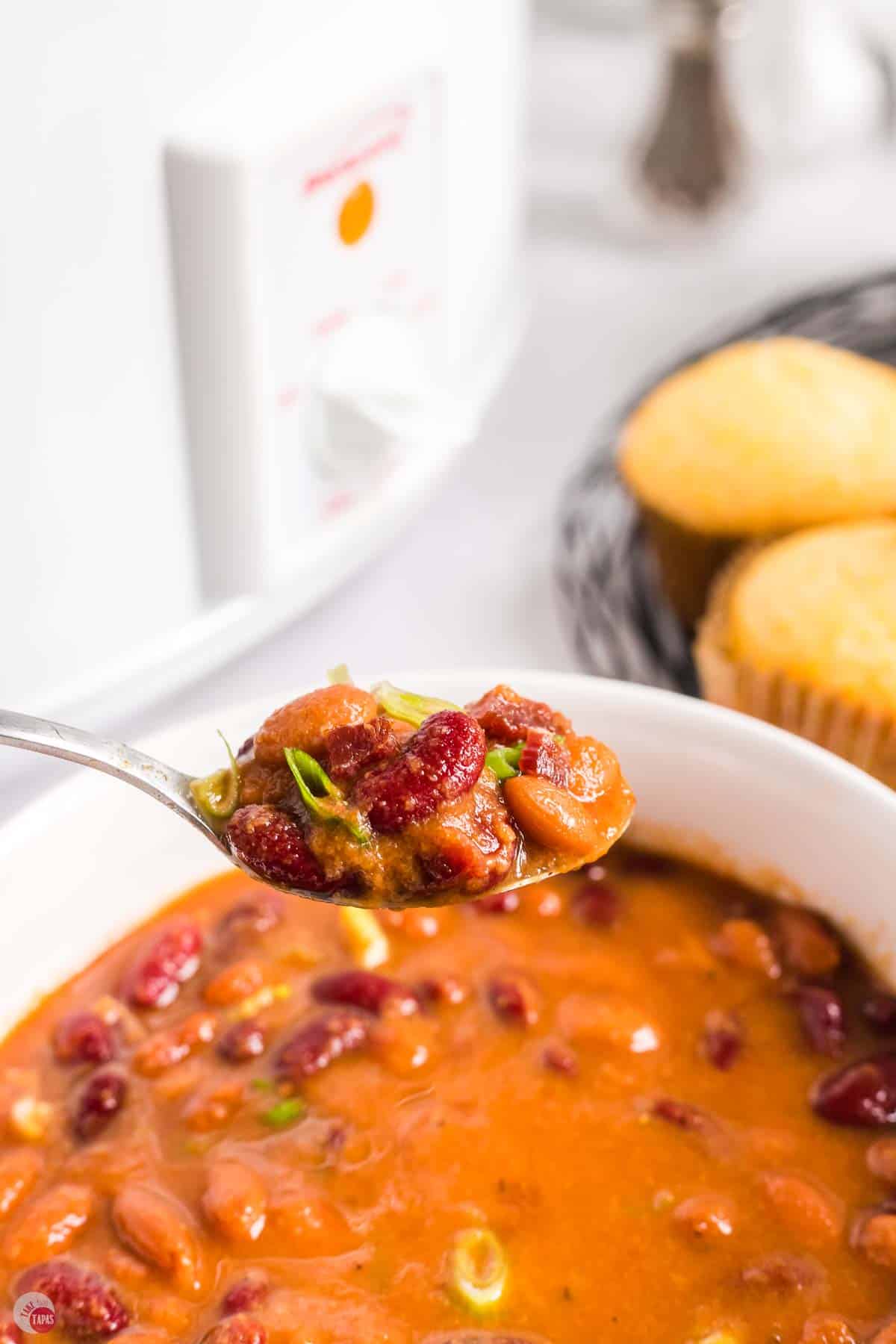 close up of beans on a spoon