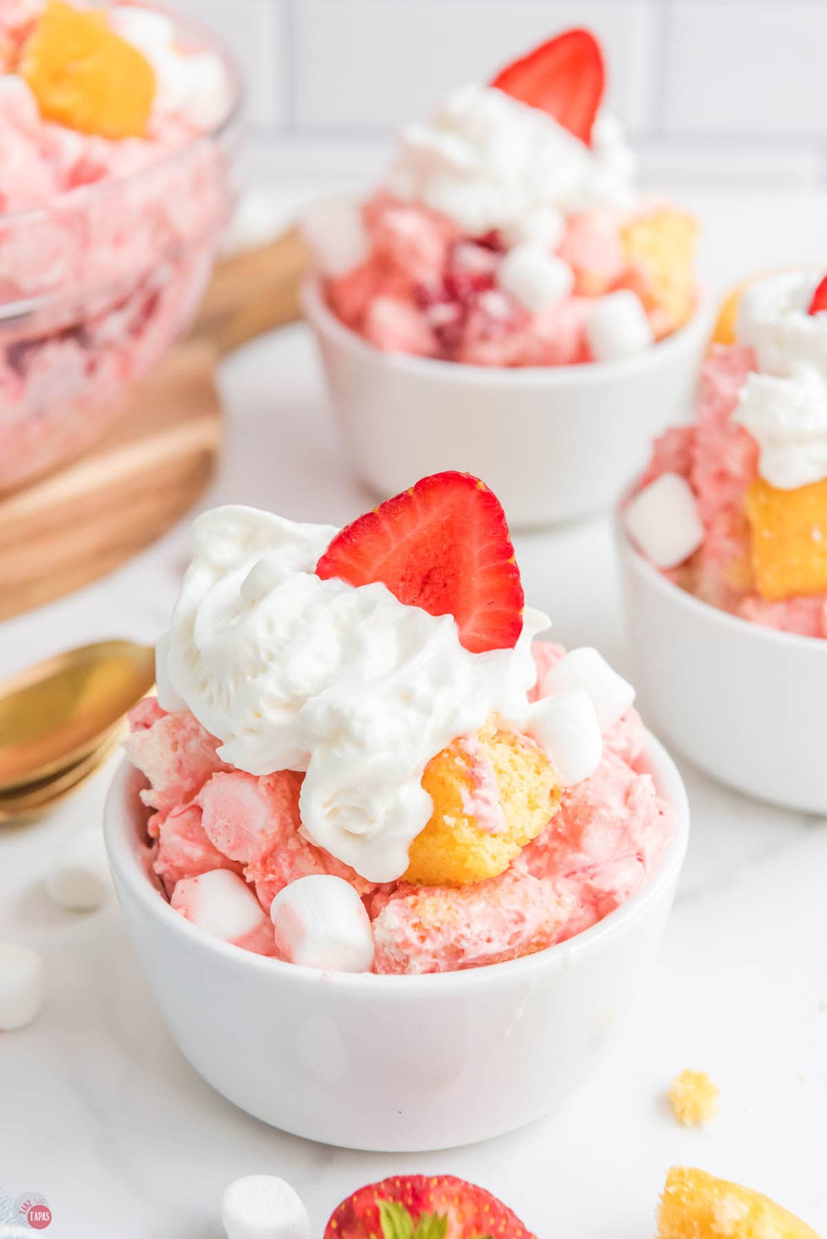 small white bowl with strawberry shortcake fluff in it