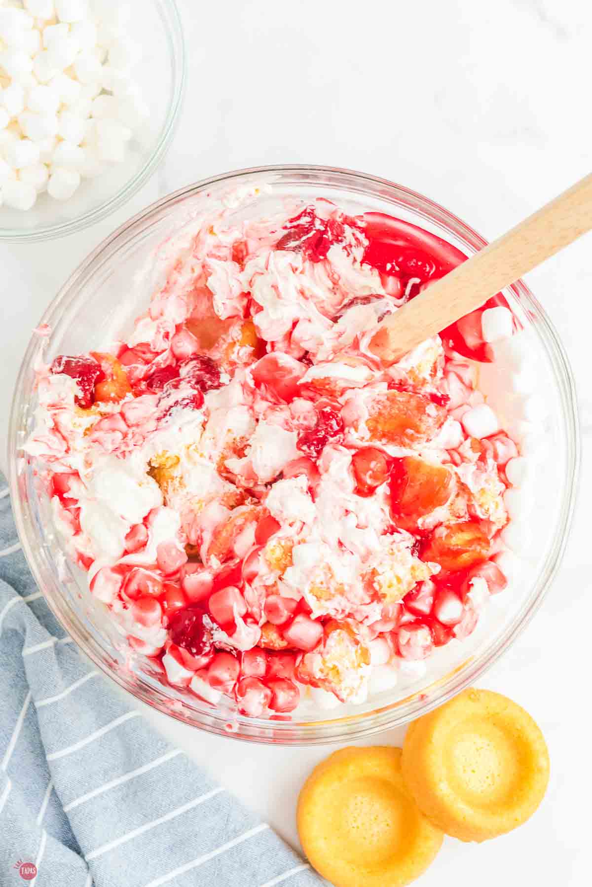strawberry marshmallow salad in a clear bowl