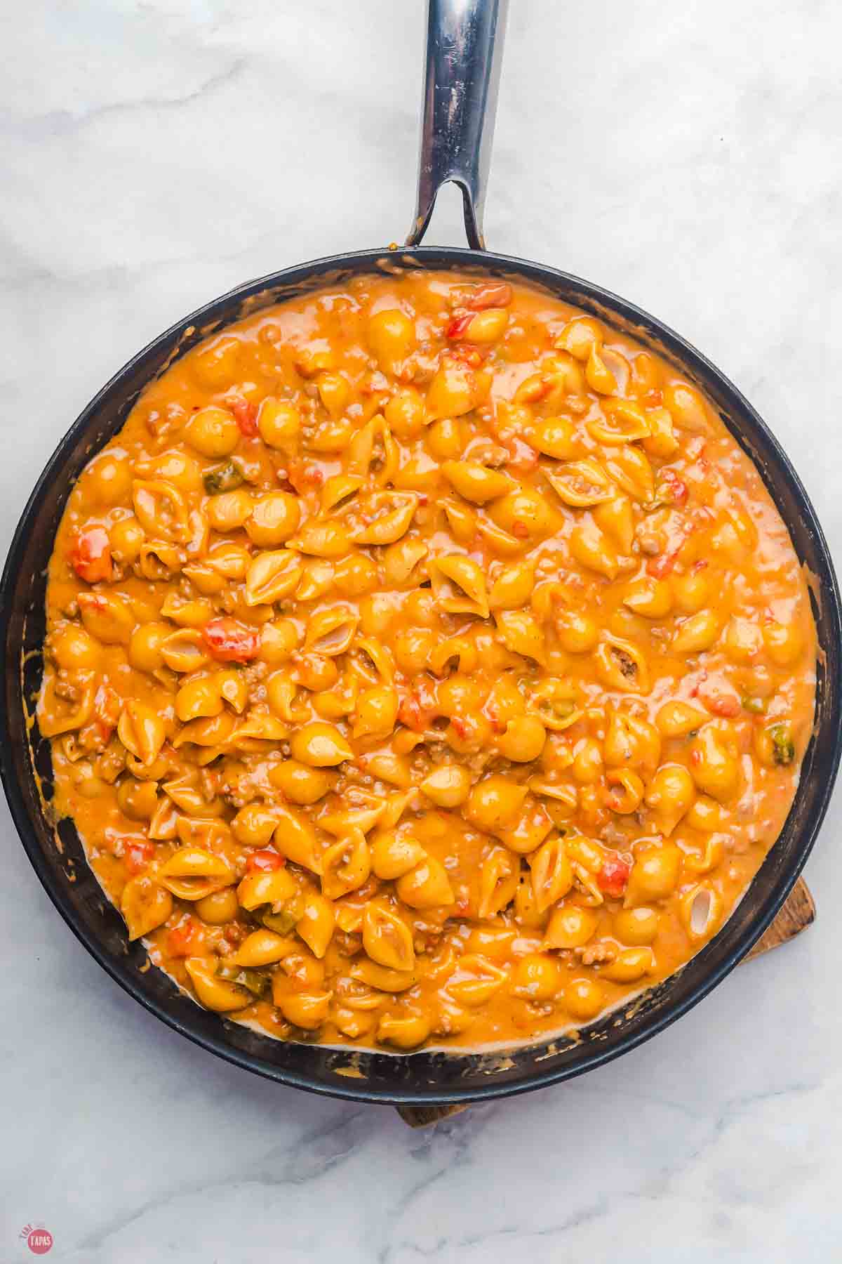 skillet of Velveeta shells and cheese with taco seasoning