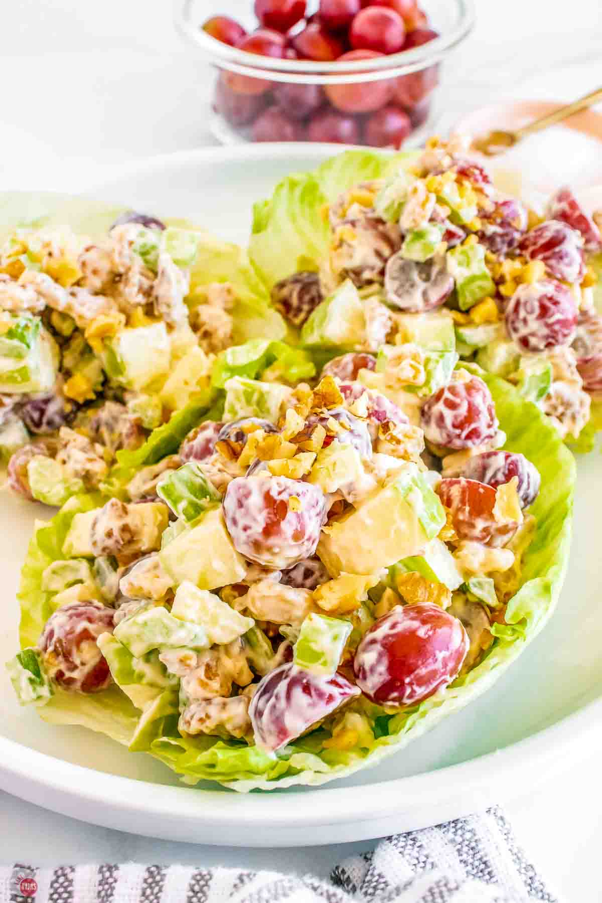 bibb lettuce cups with apples and grapes tossed in dressing