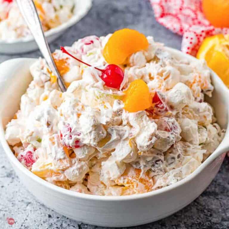 bowl of ambrosia salad with a spoon