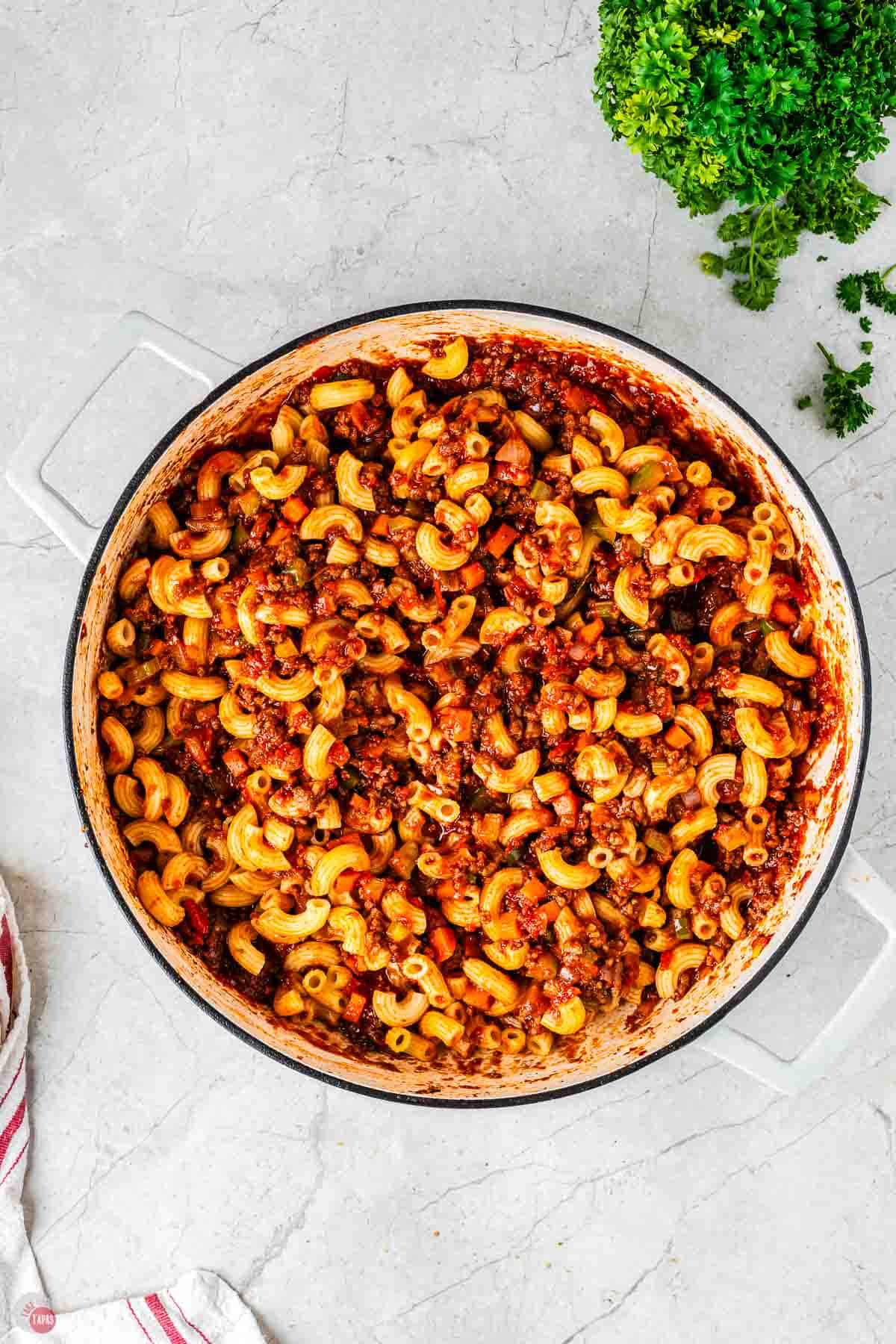 cooked beefaroni in a white pot