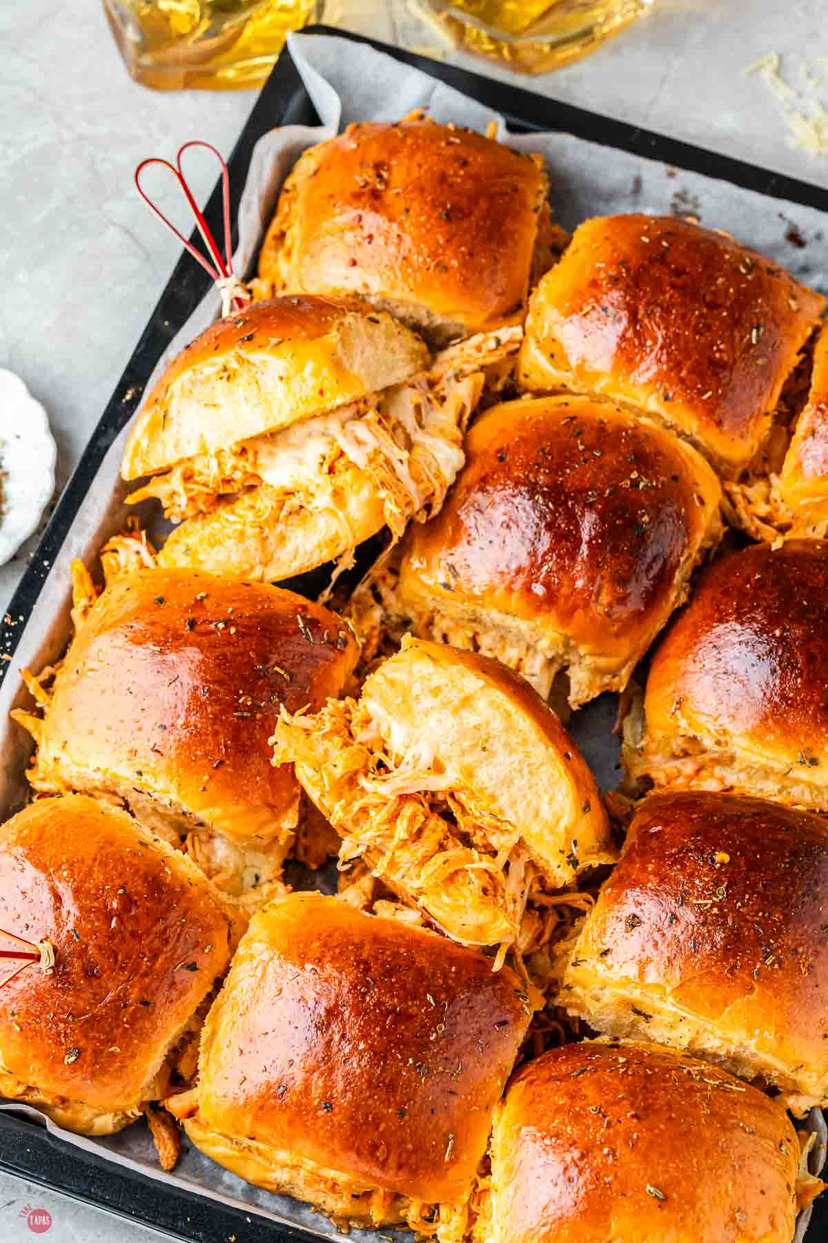 cut sliders on a baking sheet
