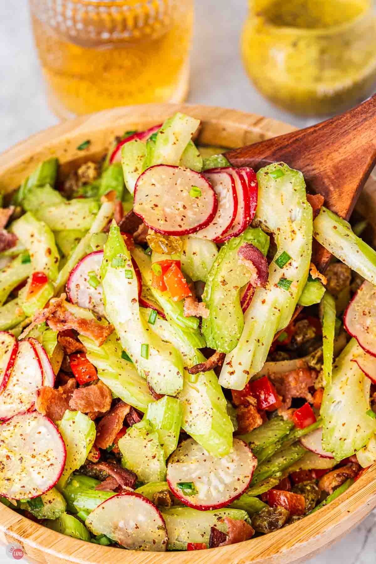close up of celery slaw on a spoon