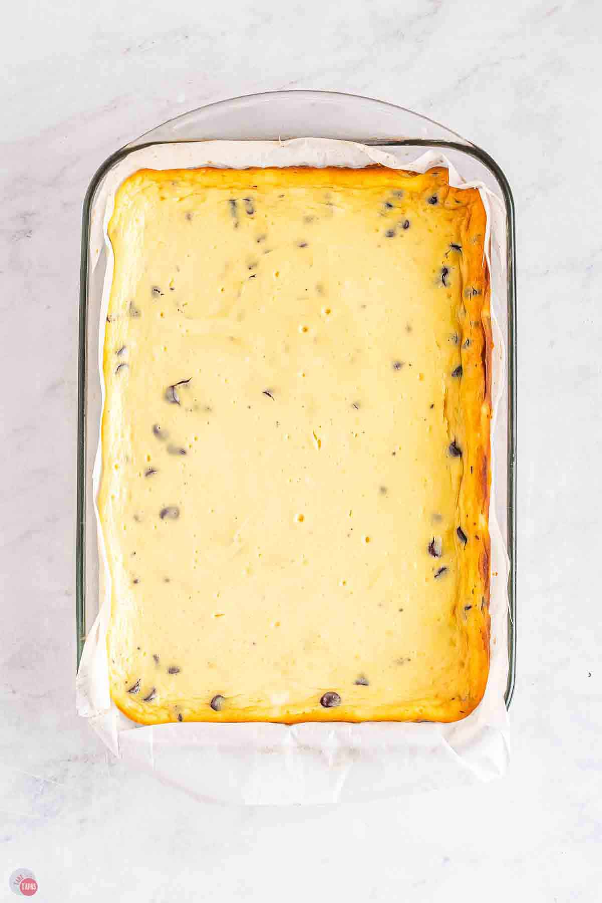 baked cheesecake in a 9x13 baking dish