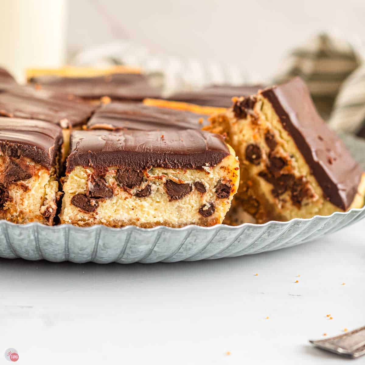 close up of side of plate topped with dessert bars