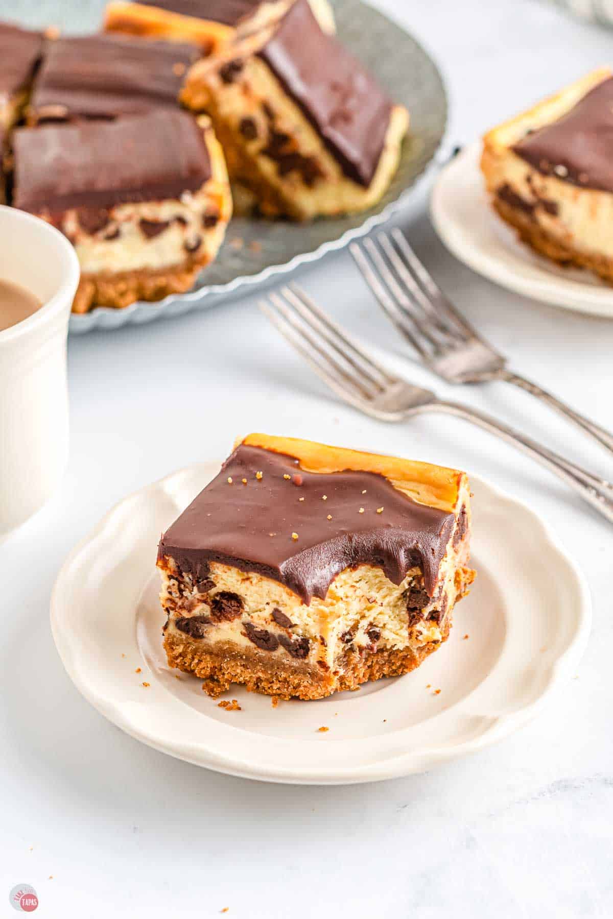 chocolate chip dessert bar on a plate with a bite missing