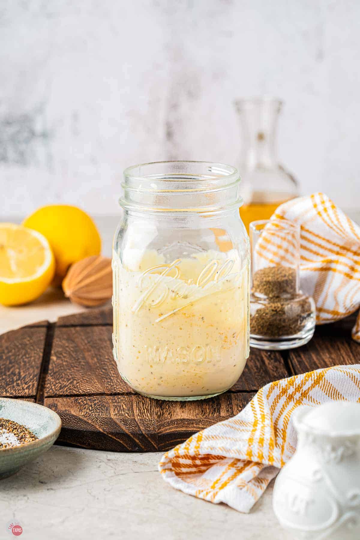mason jar with creamy dressing in it