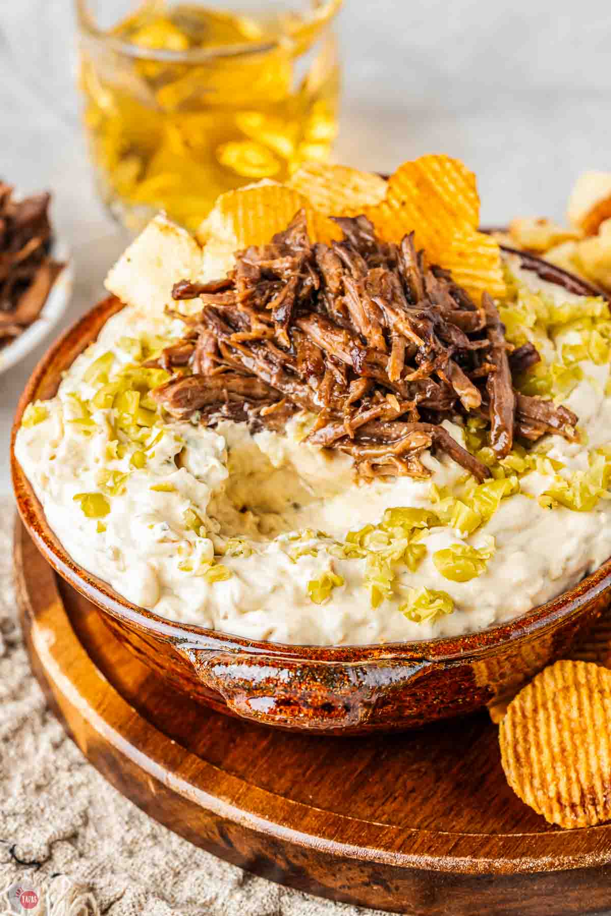 bowl of dip with a scoop missing