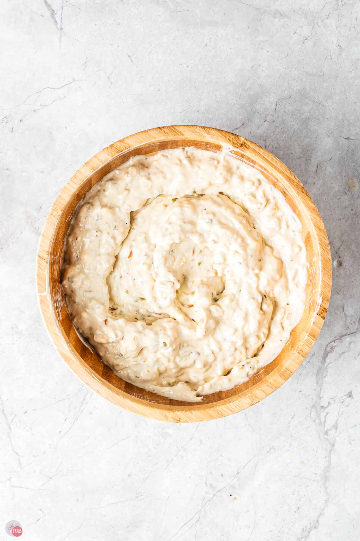mixed dip in a wood bowl