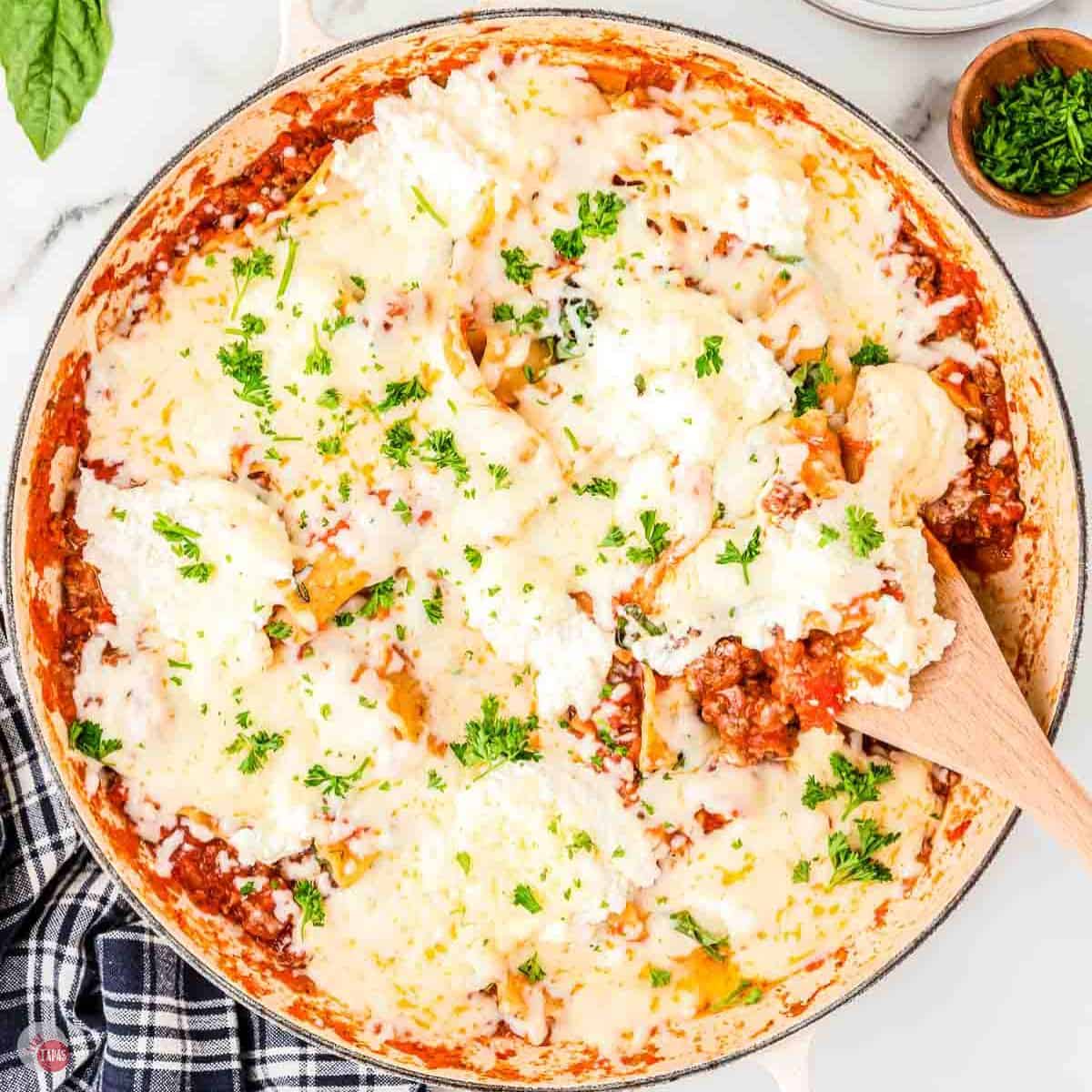 white pan filled with a skillet version of lasagna