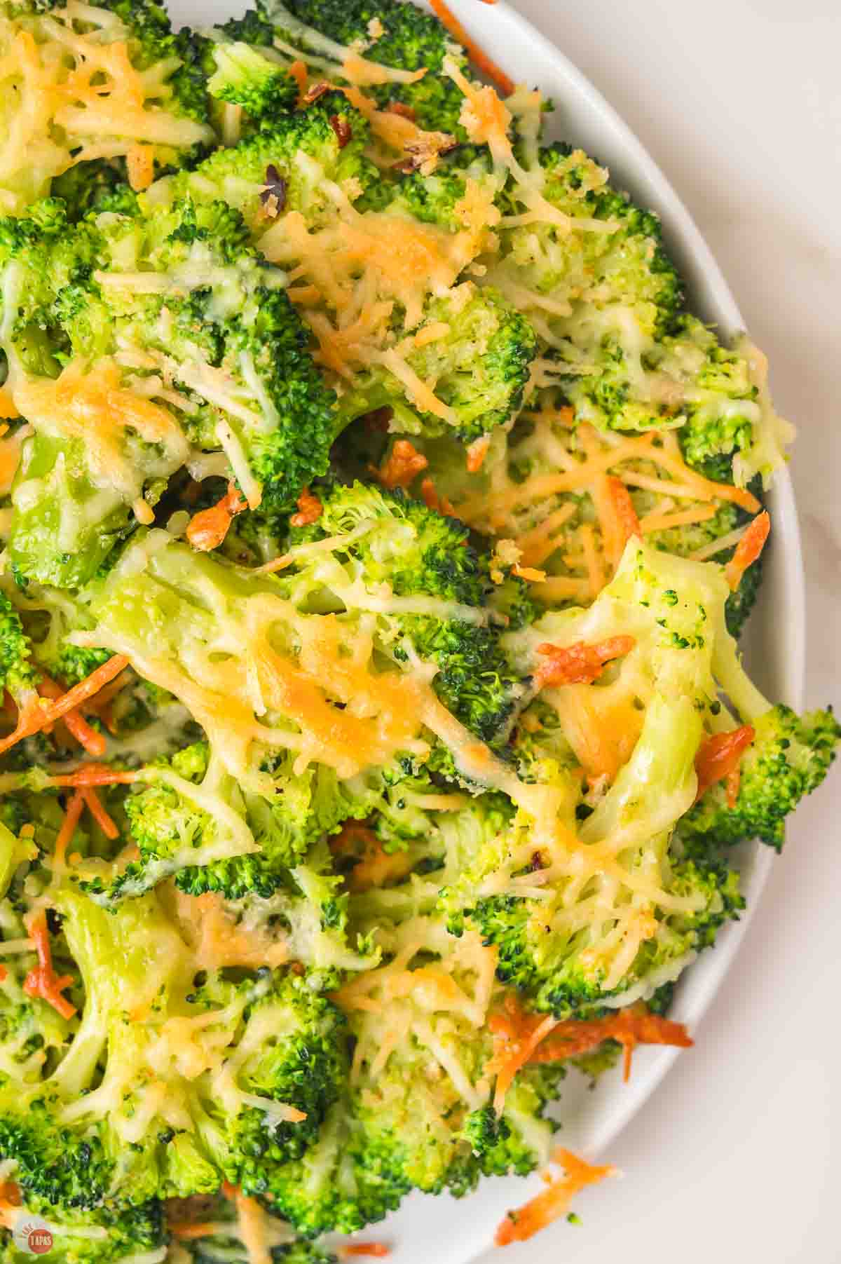 close up of smashed broccoli on a plate