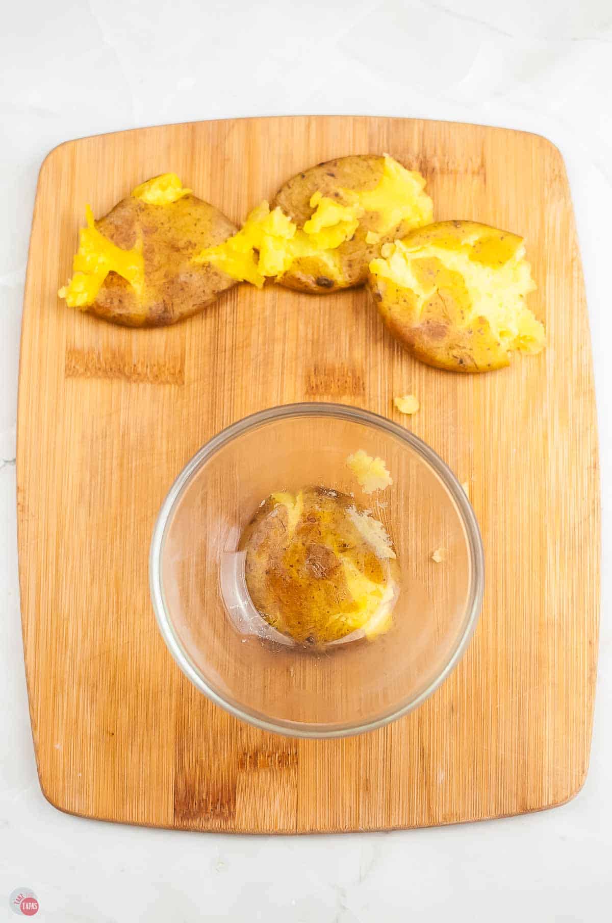 potato being smashed by a glass