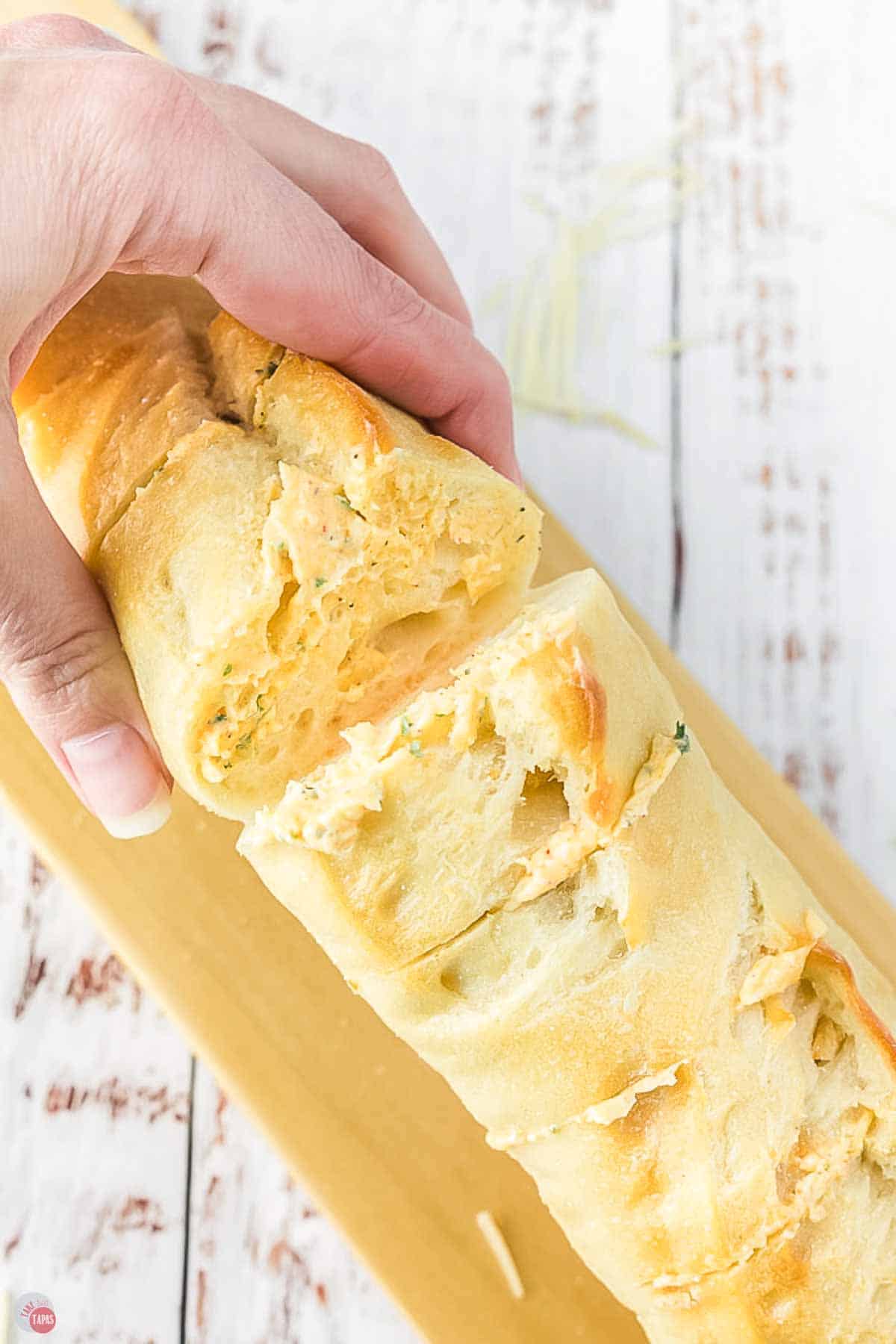sliced bread with butter in the cuts