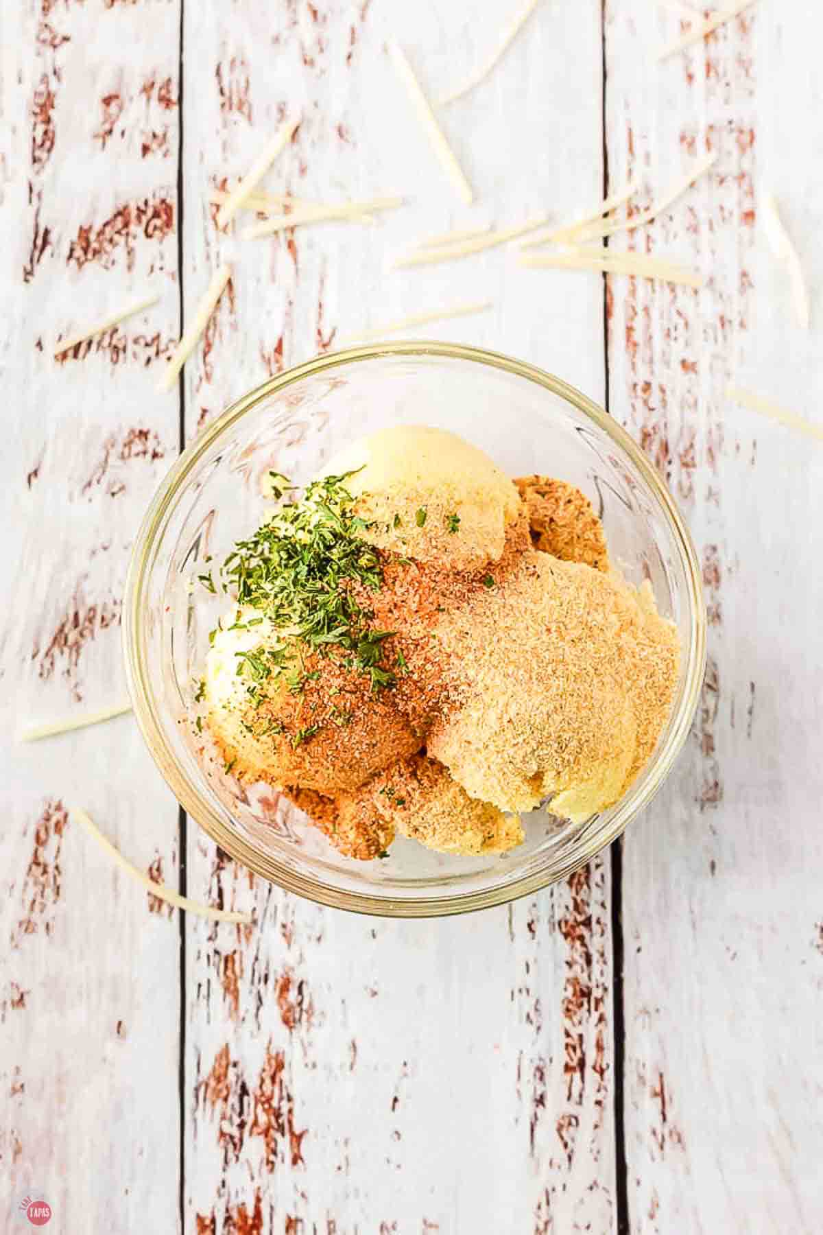 butter and spices in a clear bowl