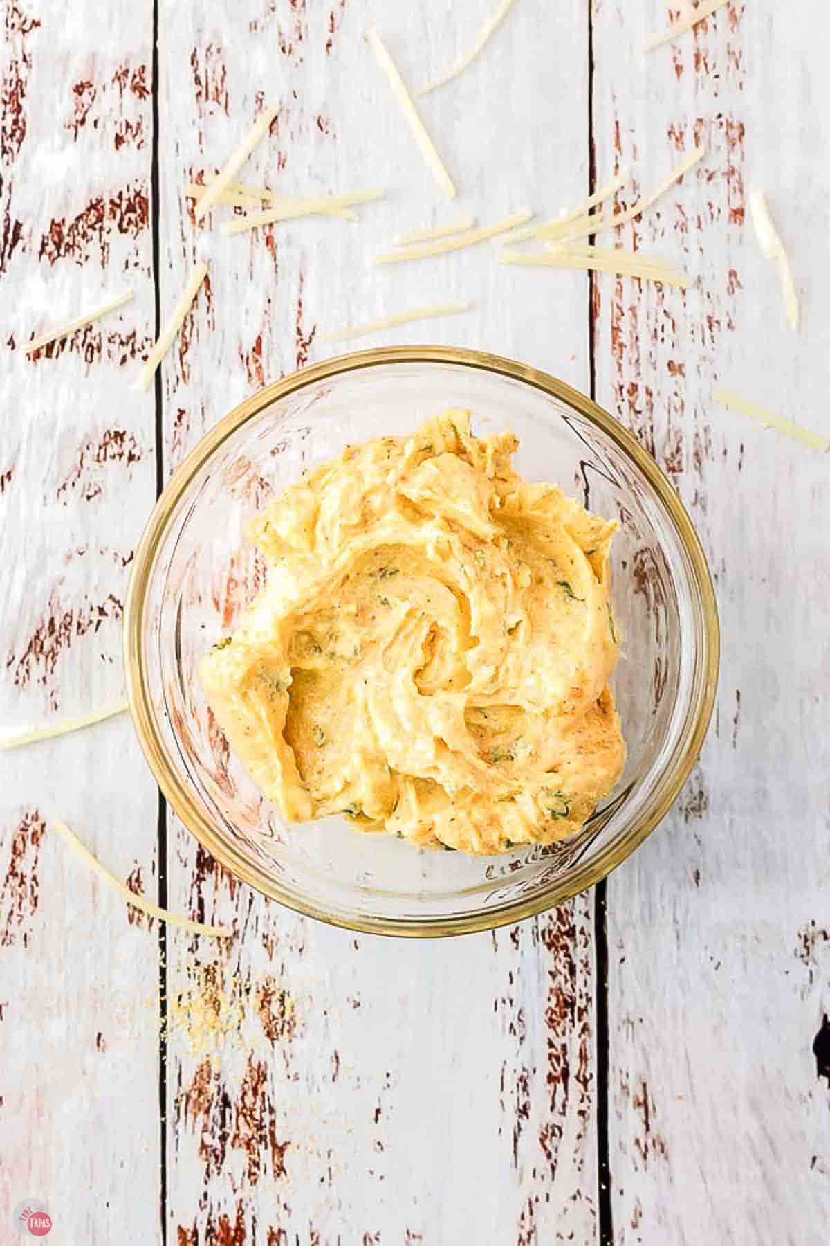 herbed butter in a clear bowl