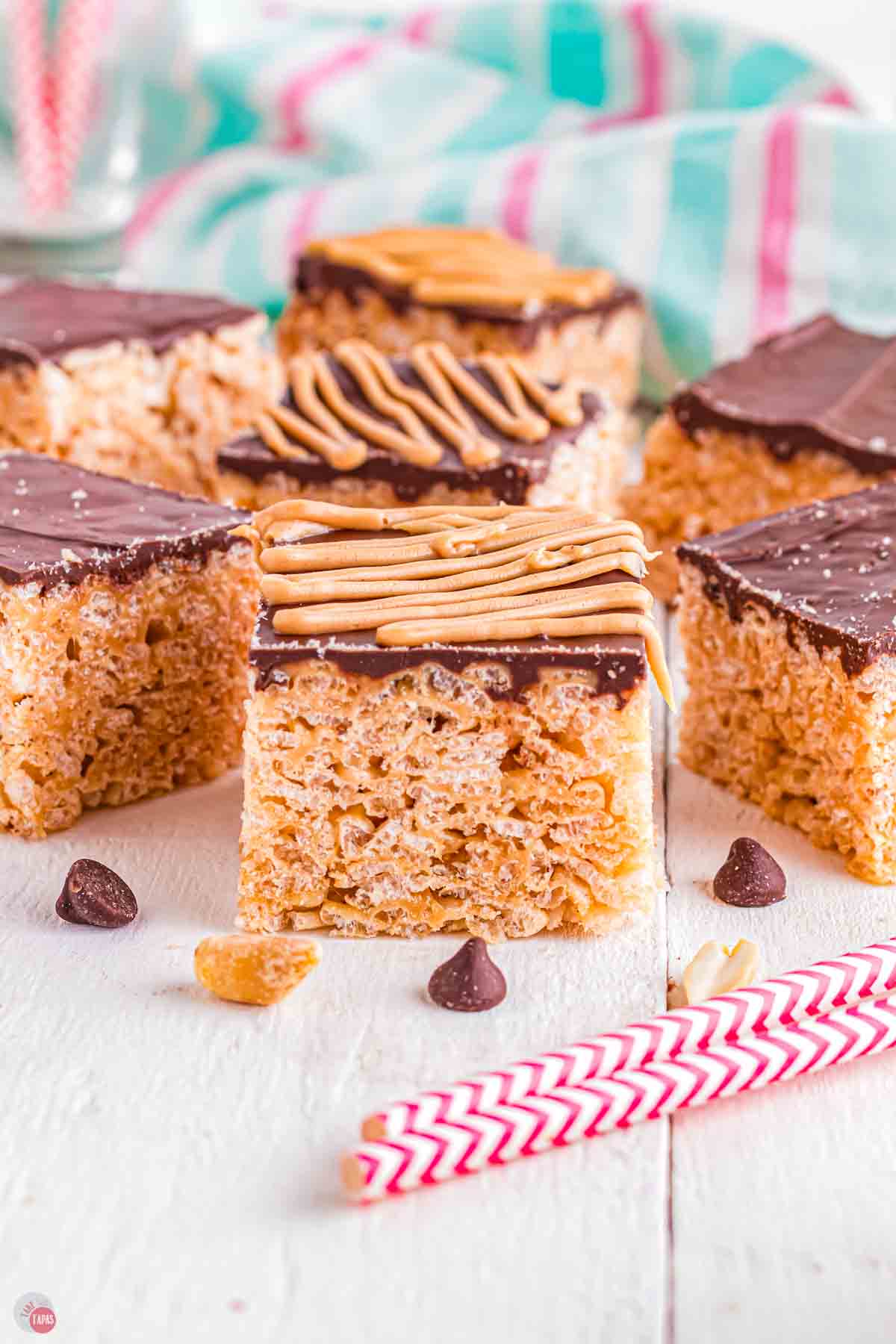 plate of rice krispie treats topped with chocolate