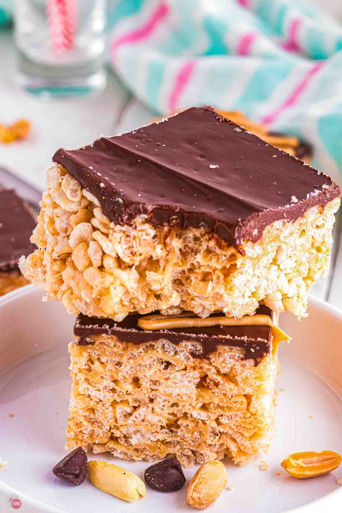 rice krispie treat with chocolate on top and a bite taken out of it
