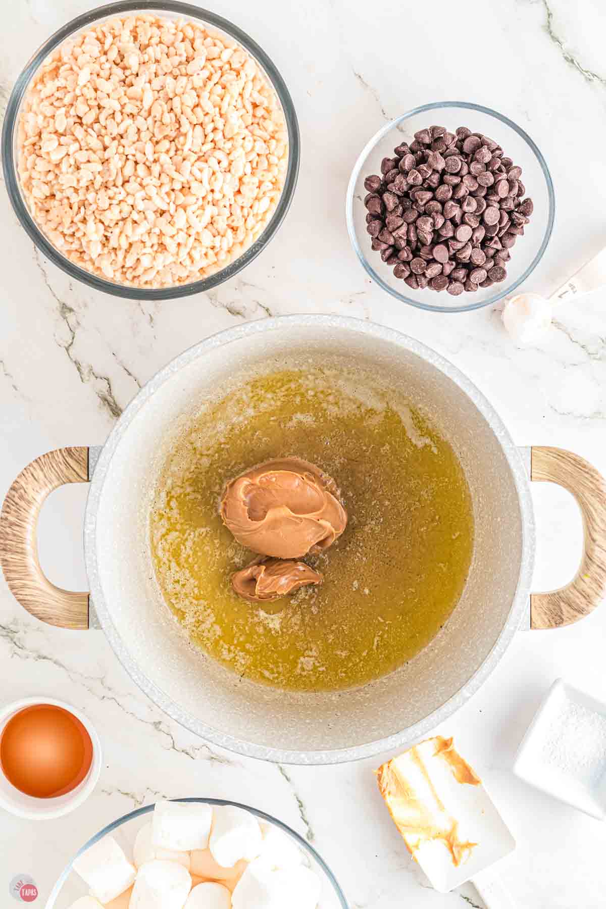 butter and peanut butter melting in a pot