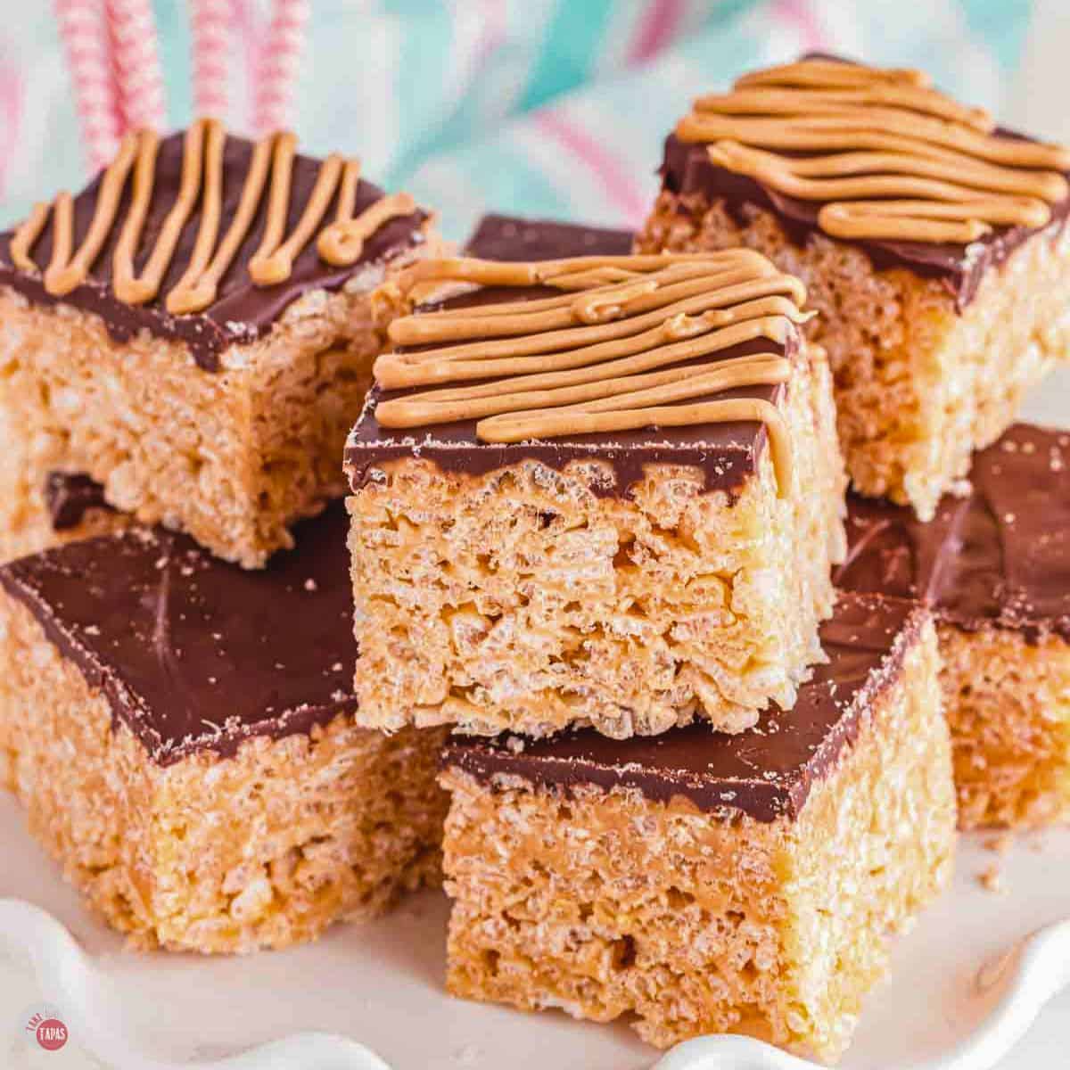 stack of rice krispie treats topped with chocolate