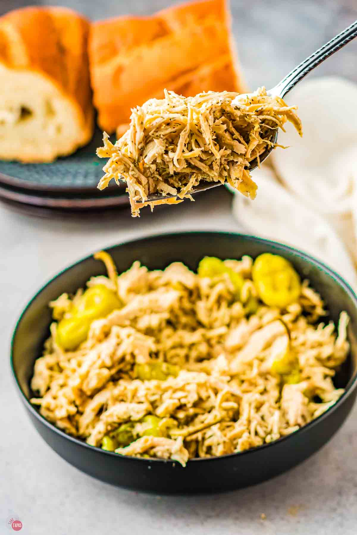 fork with bite of shredded Mississippi chicken