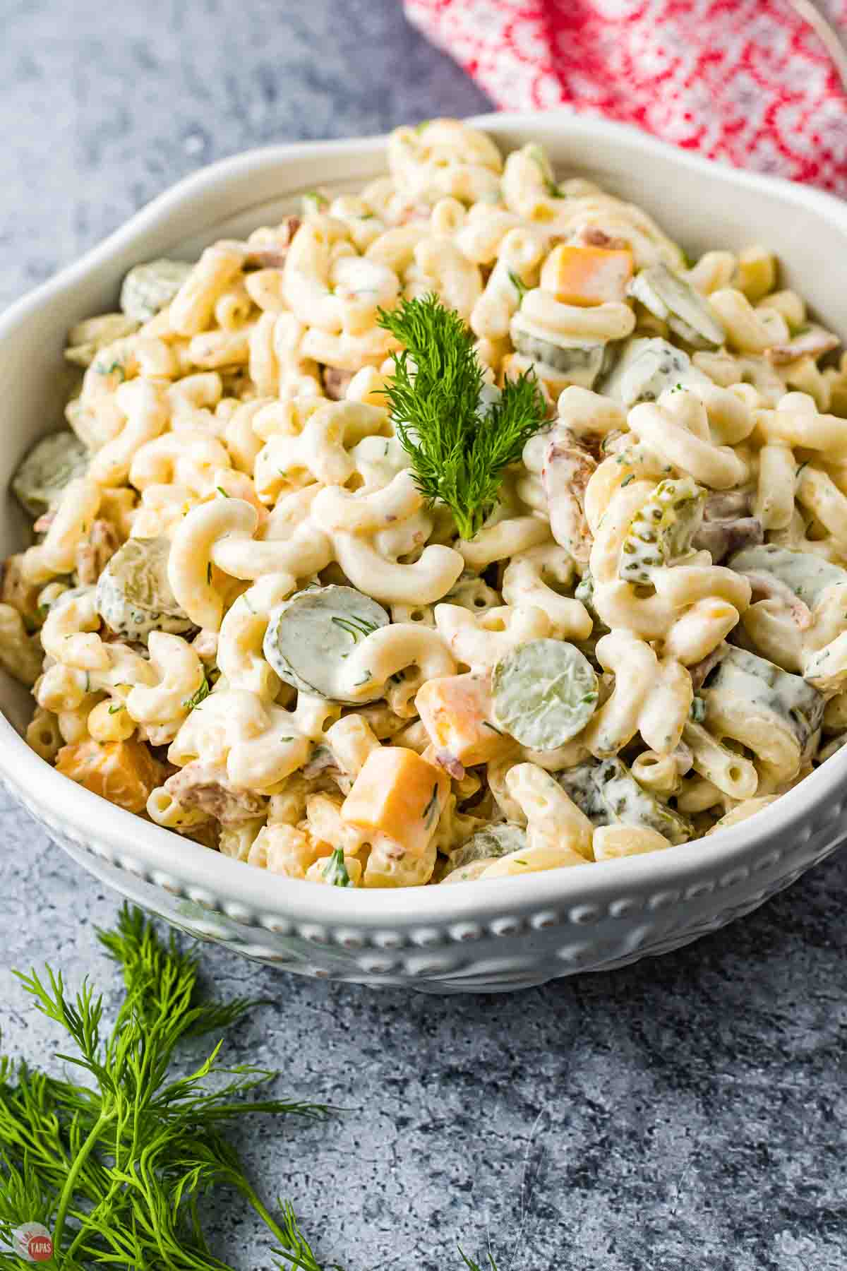 close up of pasta salad in a white bowl