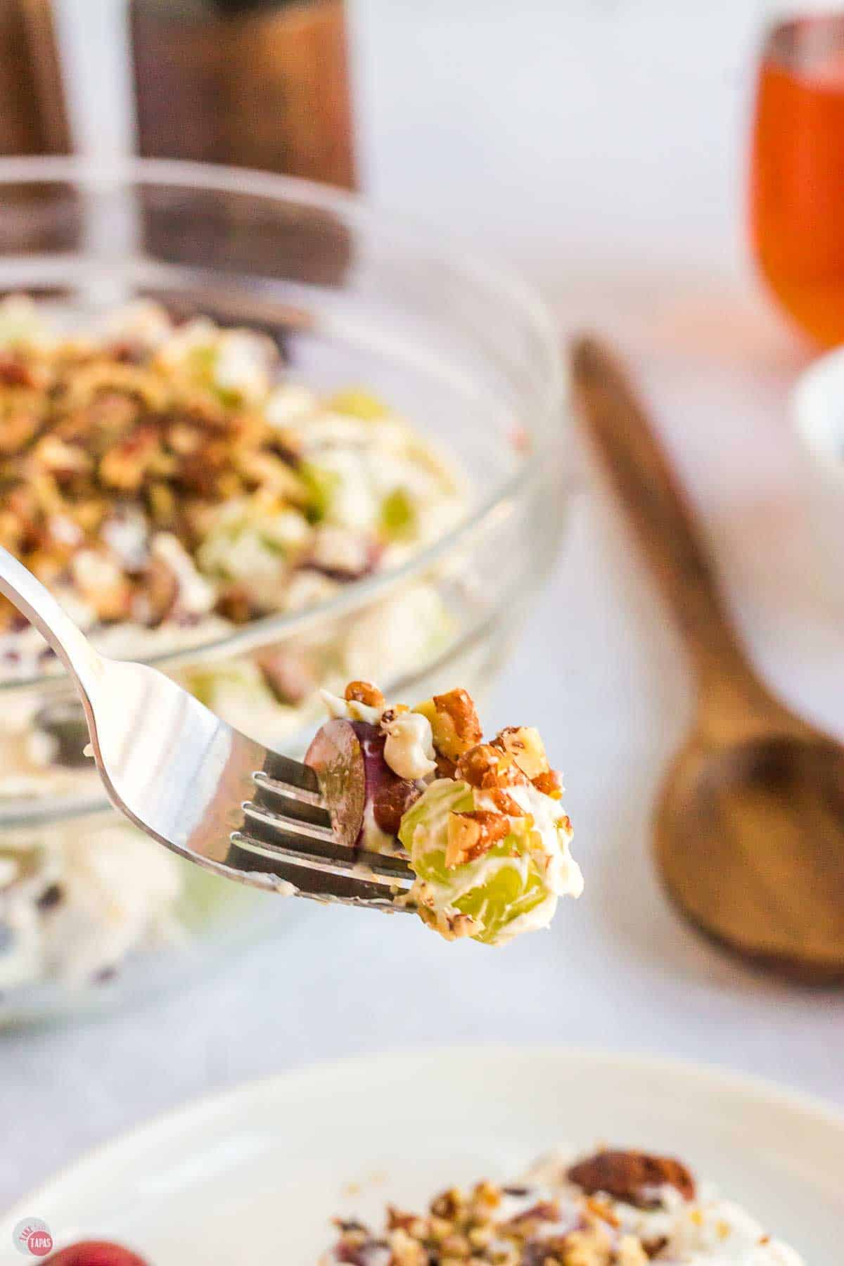 fork with bite of grape salad