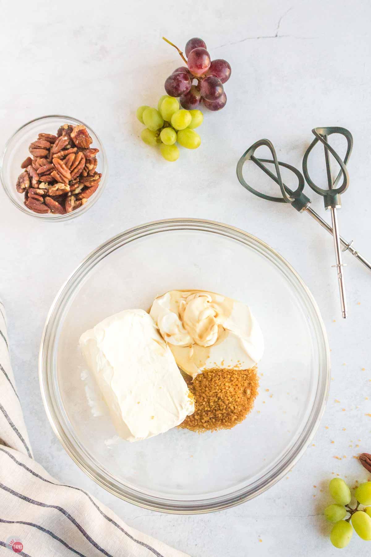 cream cheese, sour cream, and brown sugar in a clear bowl