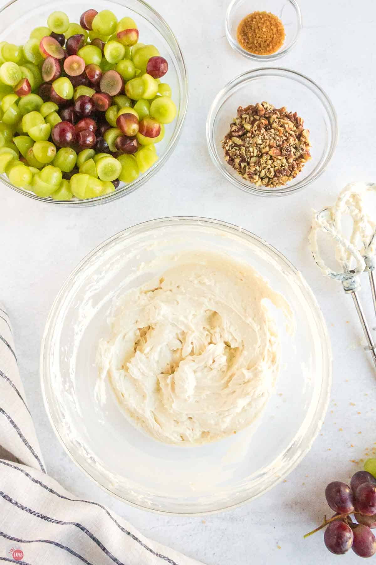 bowl of whipped cream cheese mixture in a clear bowl