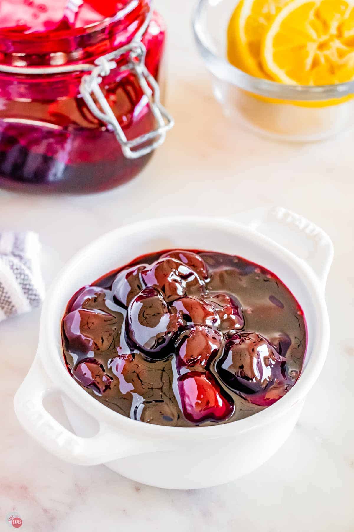 white bowl of cherry pie filling