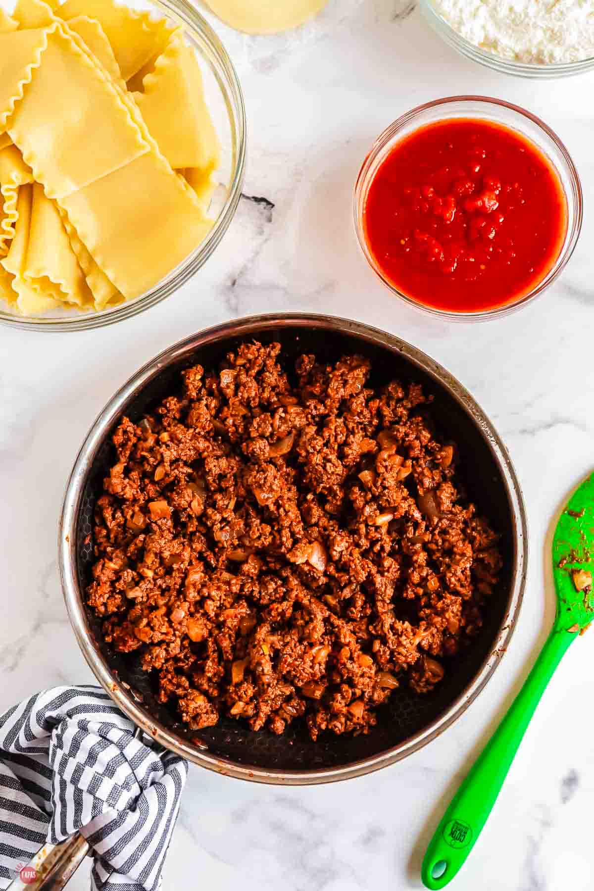 cooked meat sauce in a silver skillet