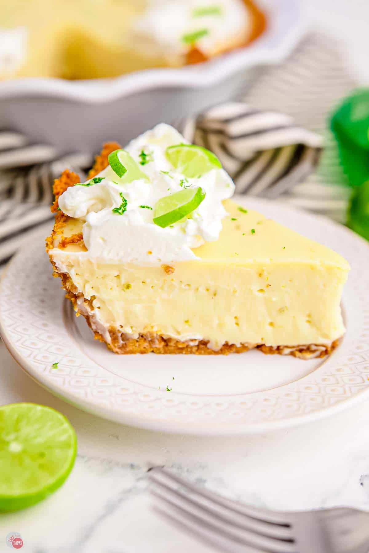 slice of key lime pie on a white plate