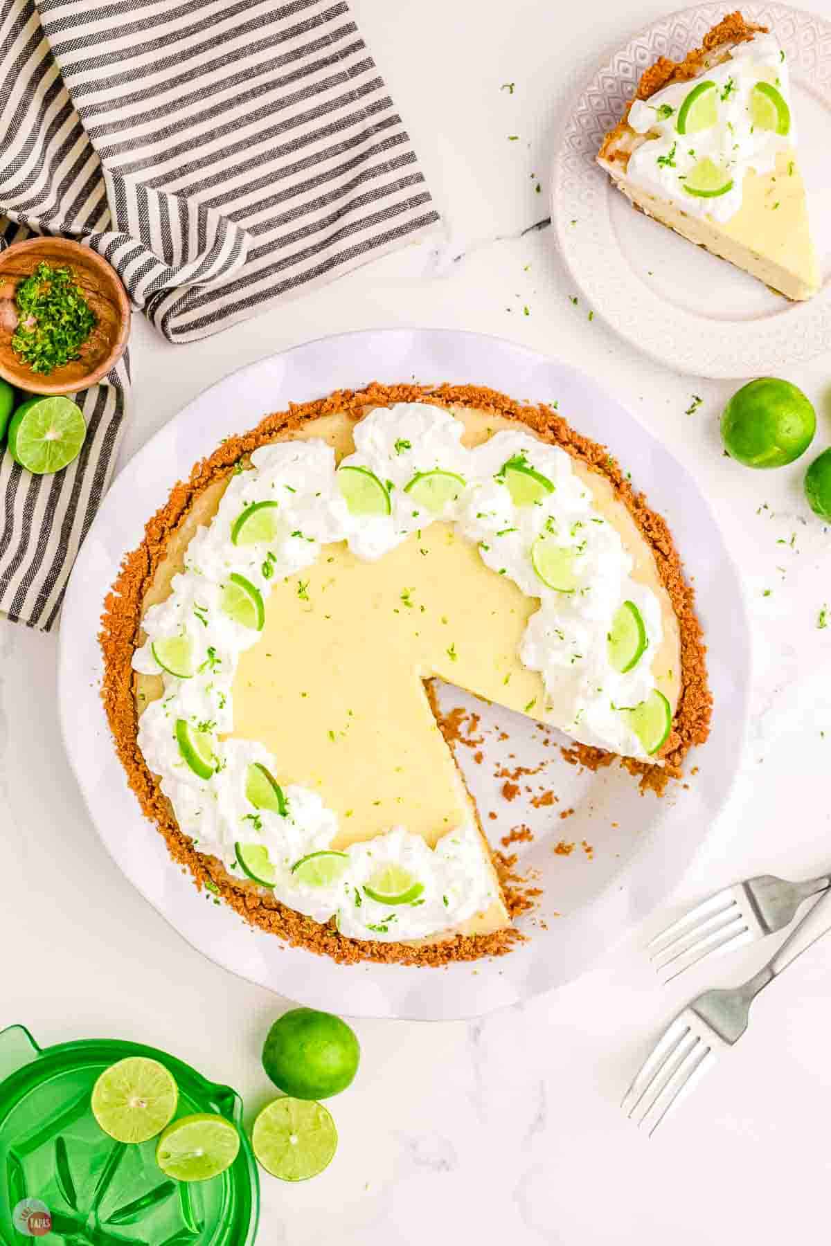 key lime pie with a slice cut out