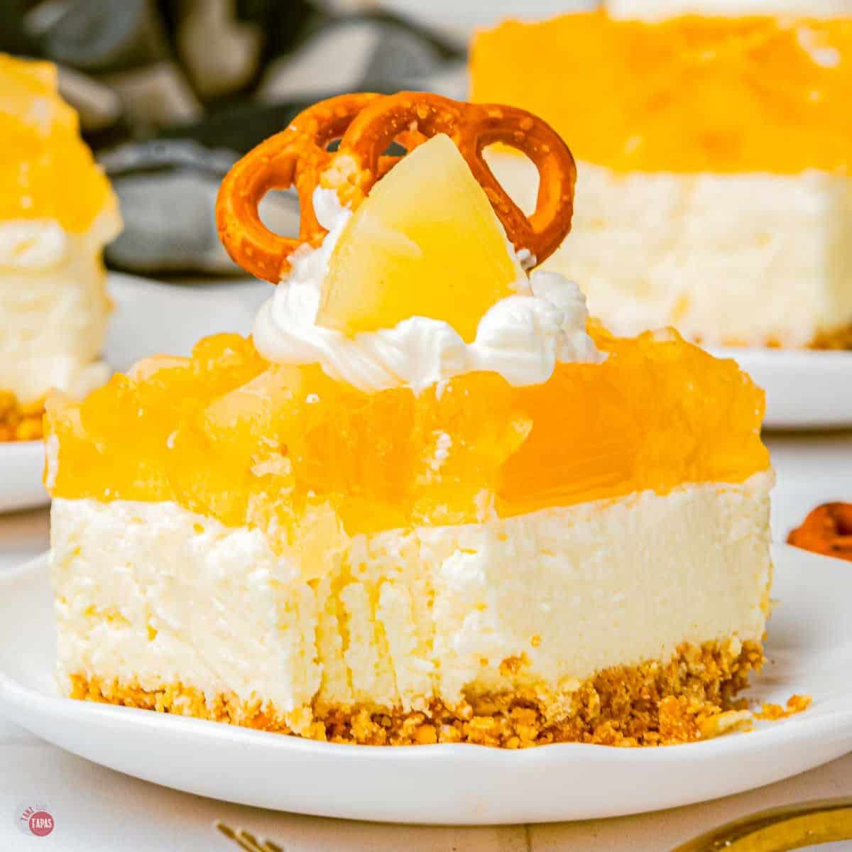 slice of pineapple pretzel salad with a bite missing