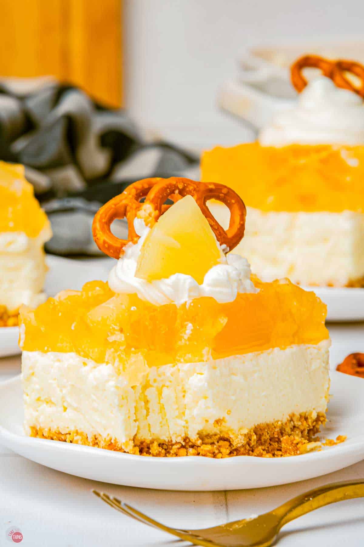slice of pineapple pretzel salad with a bite missing