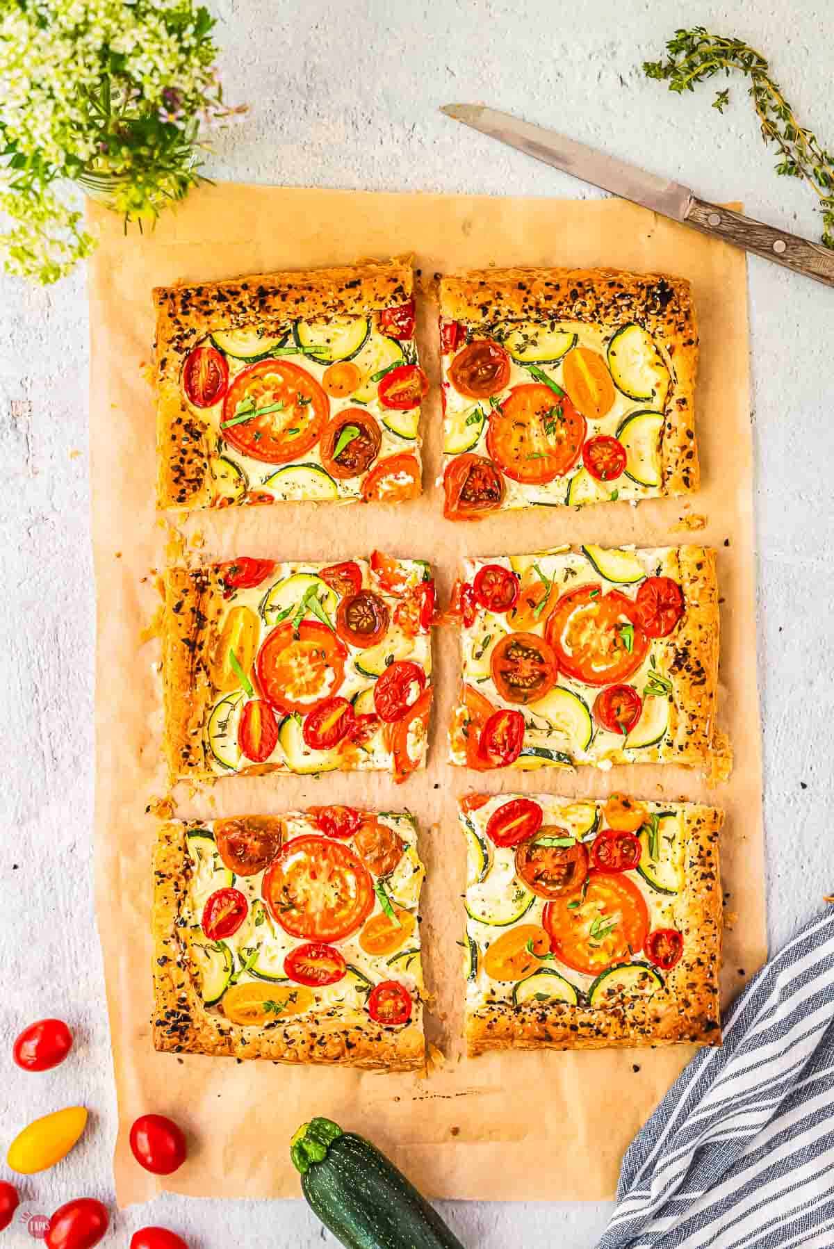 tomato tart made with puff pastry cut into squares