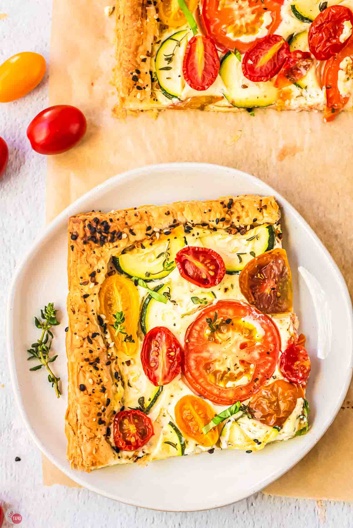 slice of tomato tart on a white plate